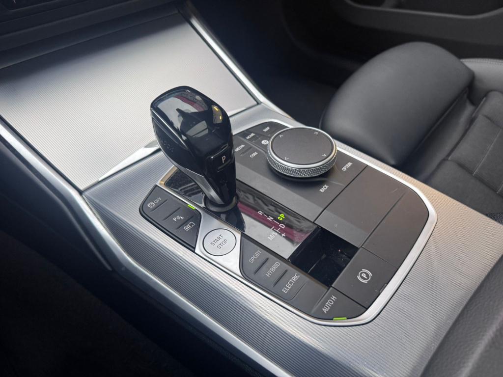 BMW 3-serie touring 330e high executive m-sport