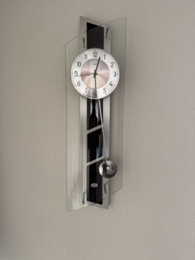 AMS slinger wandklok