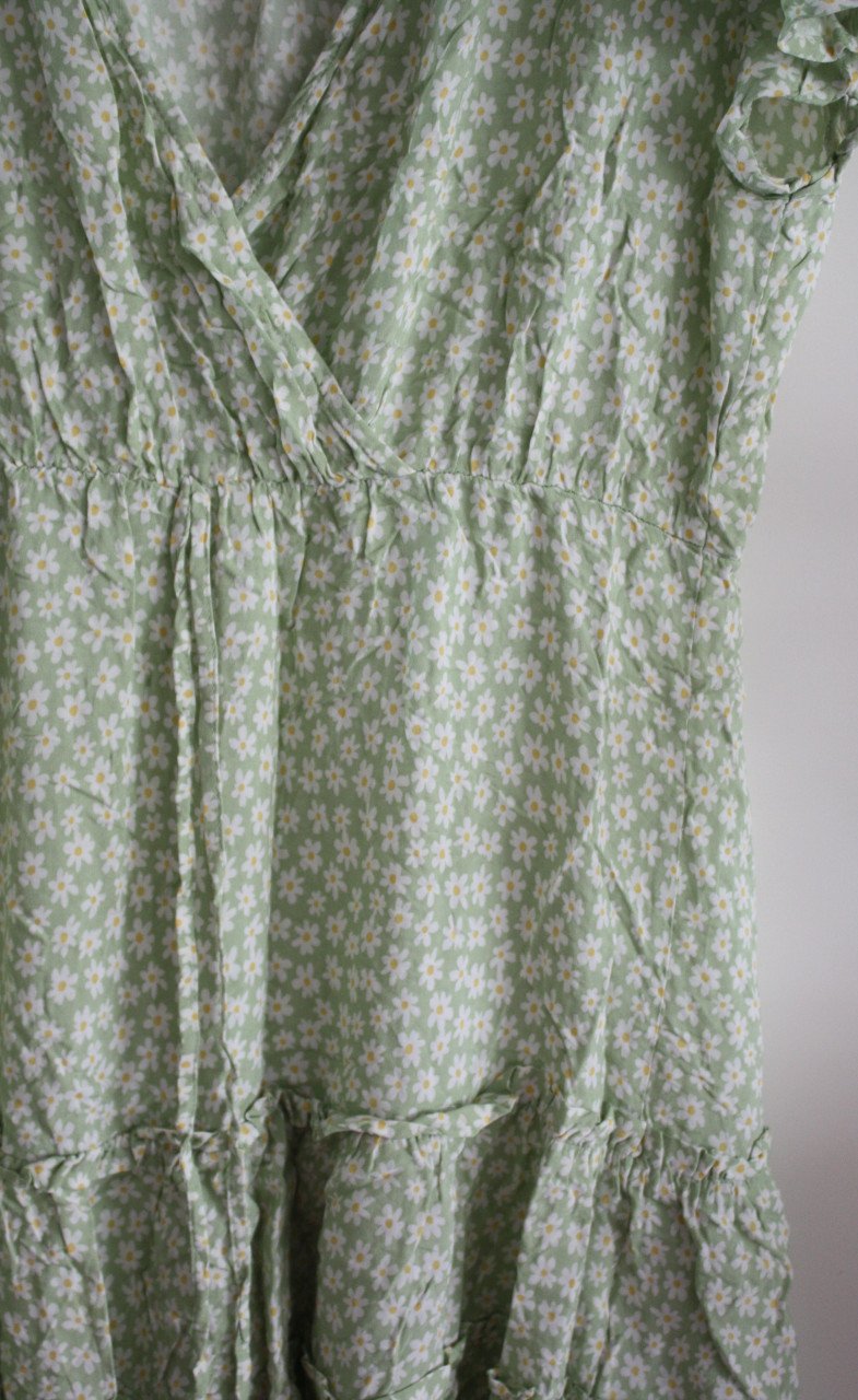 Groene jurk met witte bloemen maat 42