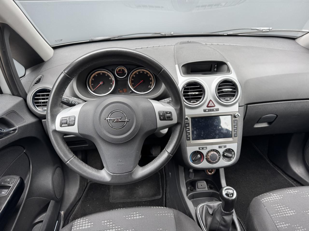 Opel Corsa 1.4 16V Edition 5DRS 2011 Zilver Airco Apk Cruise