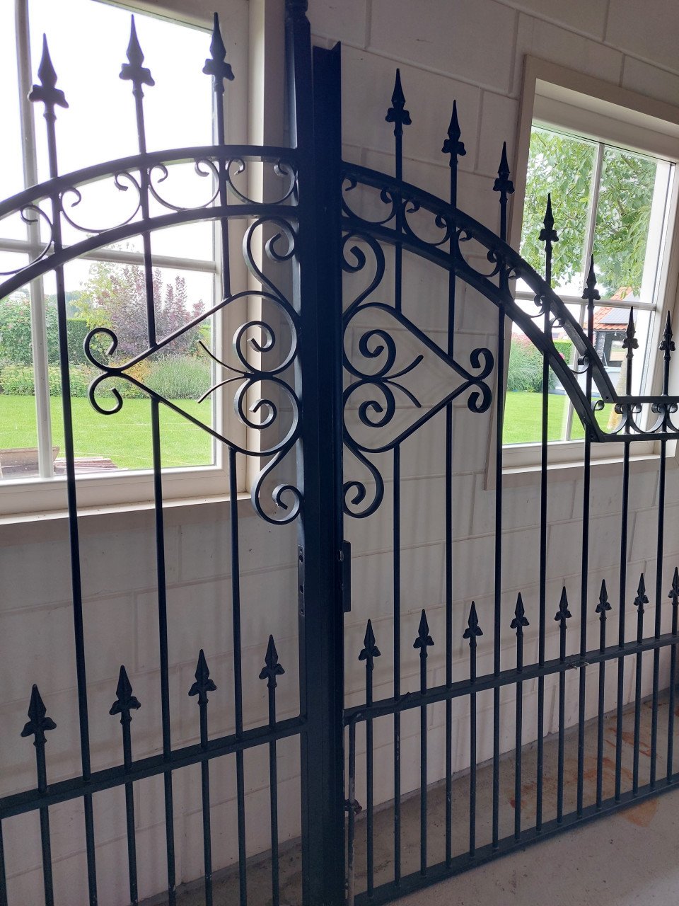 Sierhekwerk poort