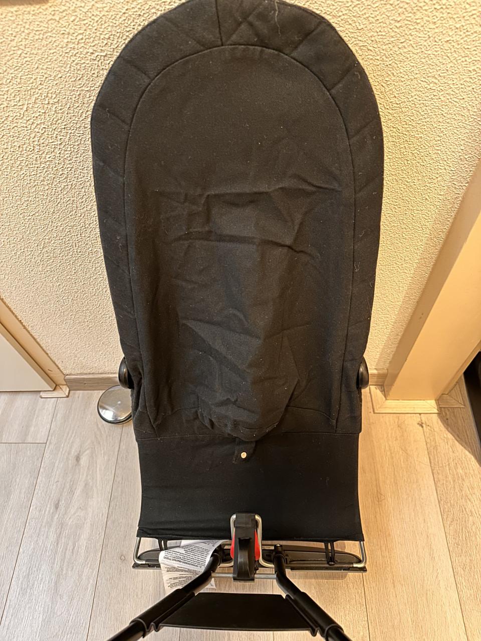 Te koop: Baby Björn wipstoel met houten speeltje
