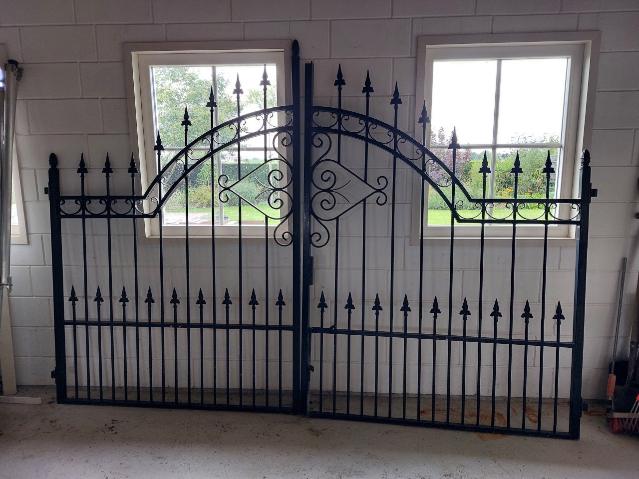Sierhekwerk poort