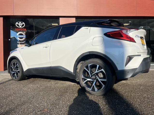 Toyota C-hr 1.8 hybrid bi-tone | leer | 18'' | camera | nav | 73.000km!