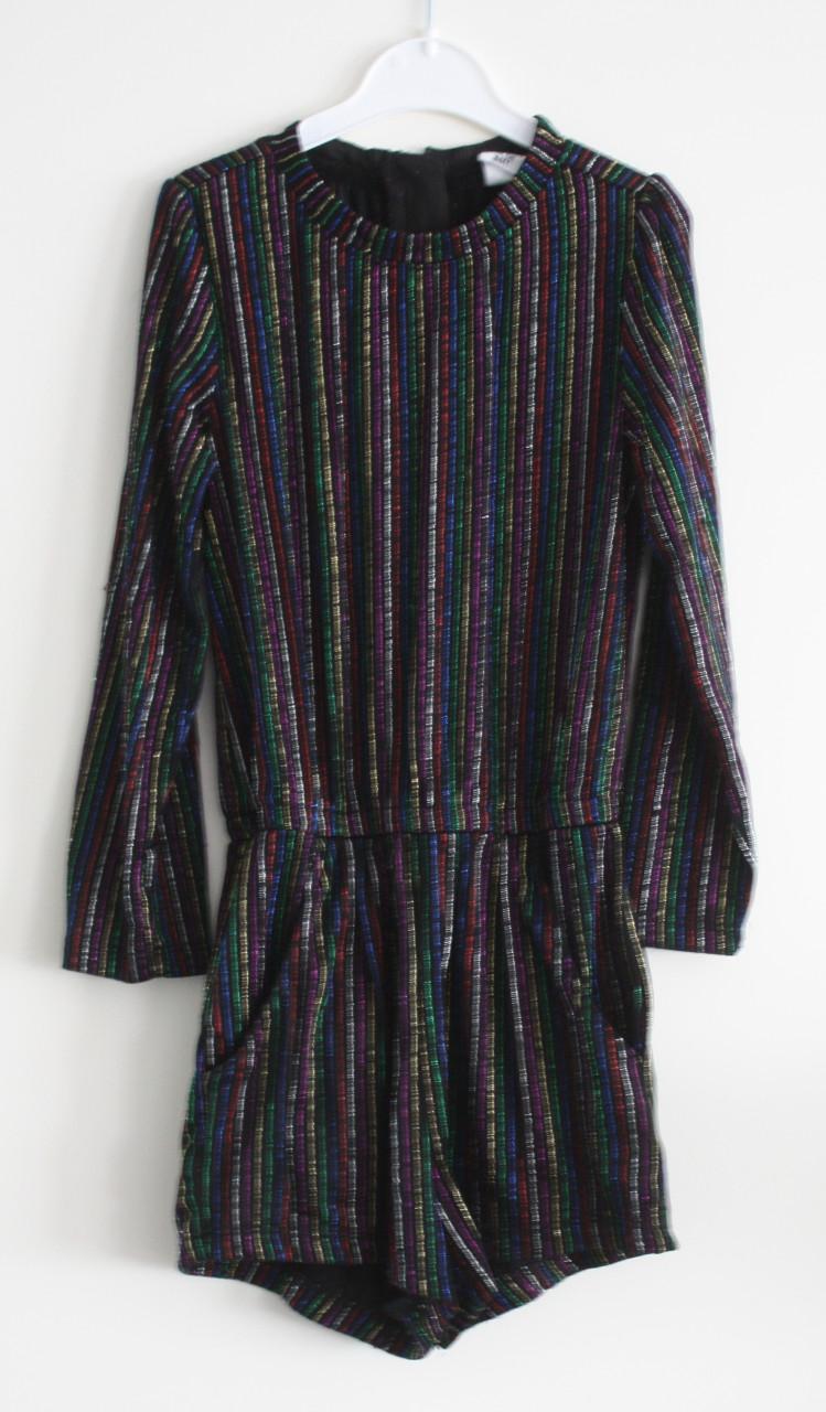 Jumpsuit zwart met glitter strepen  maat 110-116
