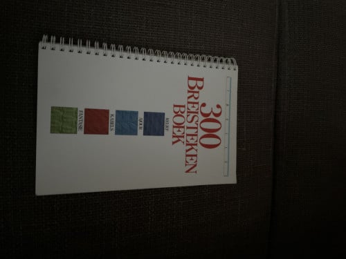Breistekenboek en breinaalden en toebehoren
