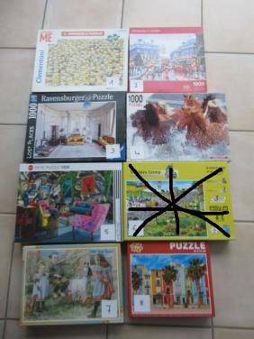 7 verschillende volledige leuke puzzels van 1000 stukjes, zo goed als nieuw