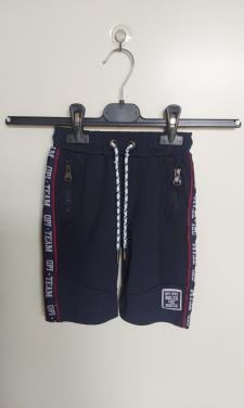 Donkerblauwe korte broek van het merk Quapi boys in maat 92.
