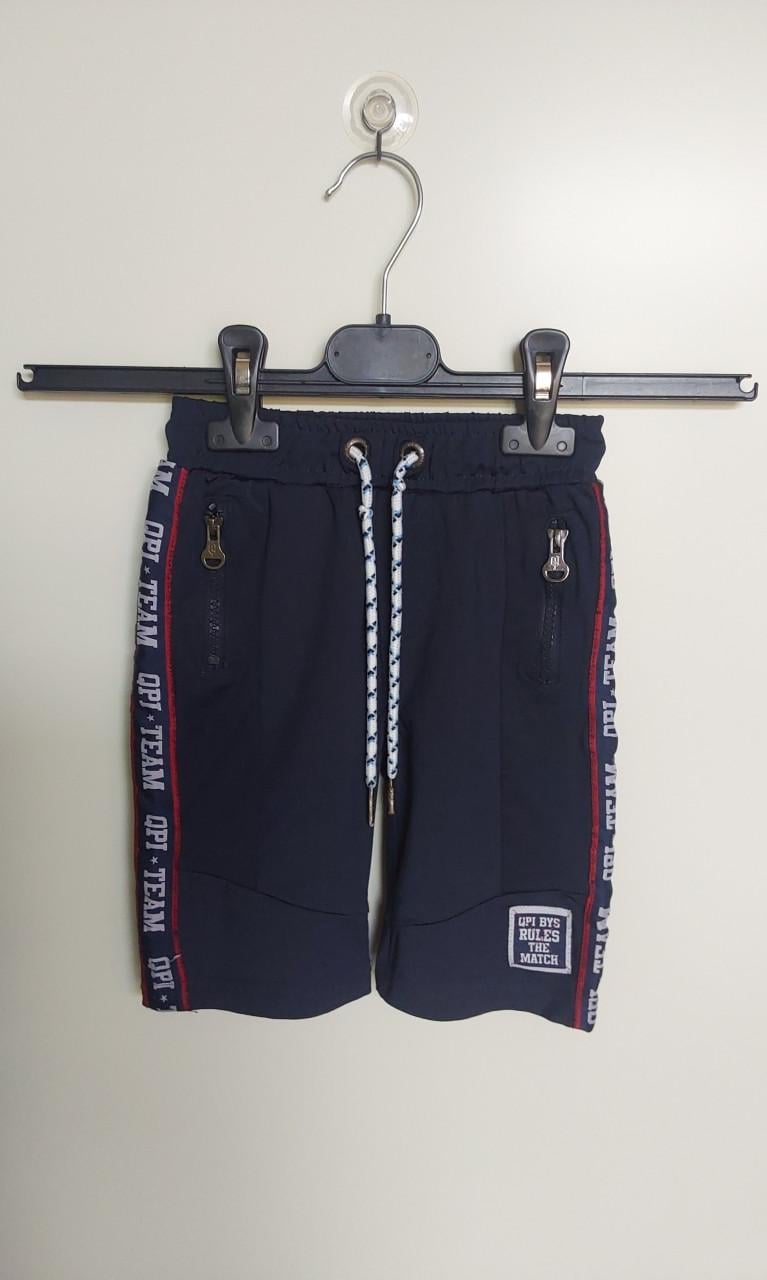Donkerblauwe korte broek van het merk Quapi boys in maat 92.