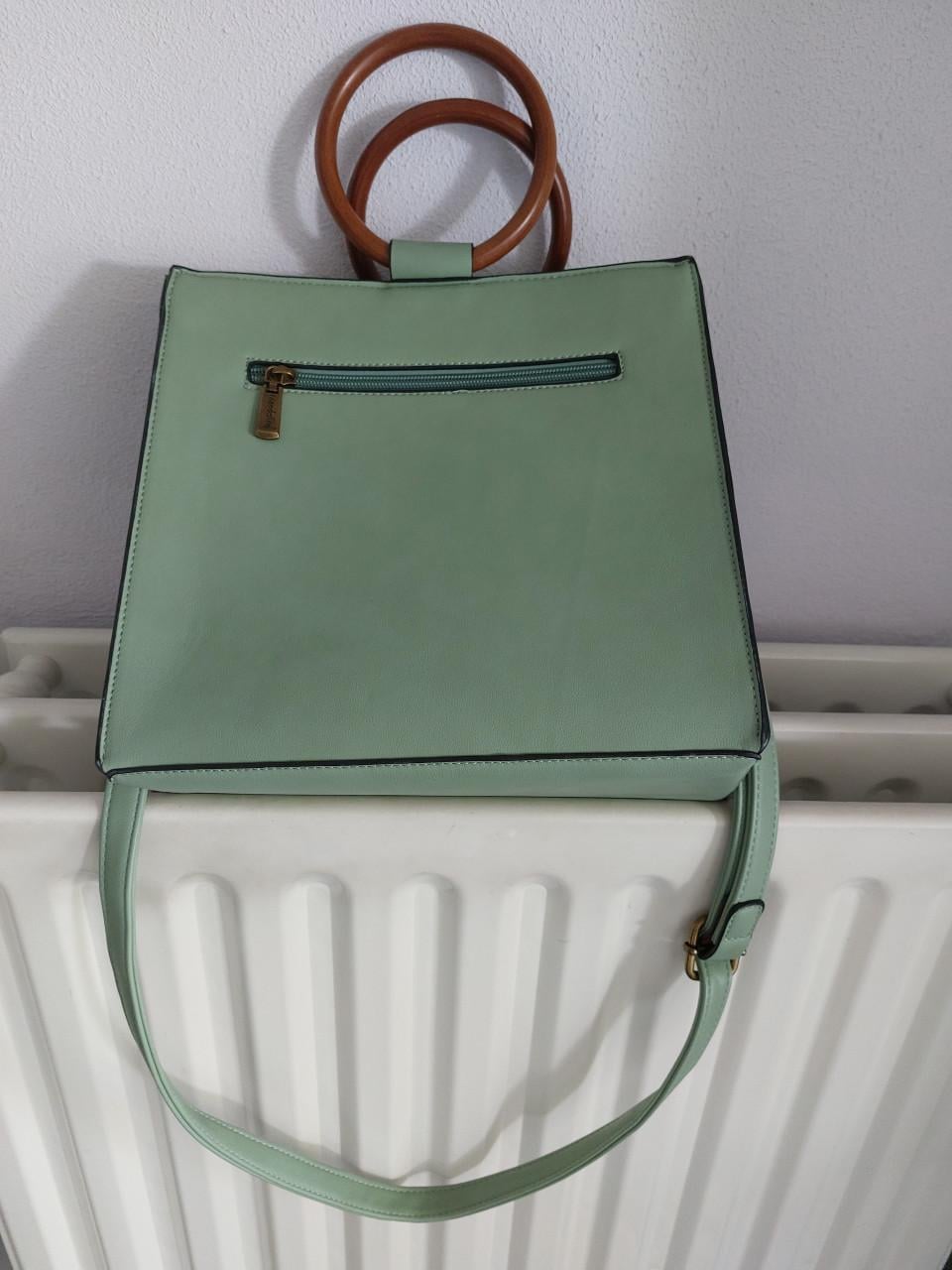 NIEUWE TAS.