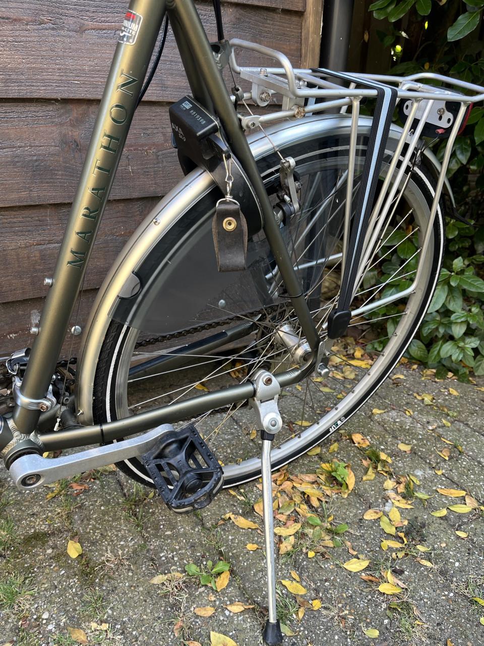Herenfiets Sportfiets Sparta Marathon 21 versn. Velgrem, verlichting.