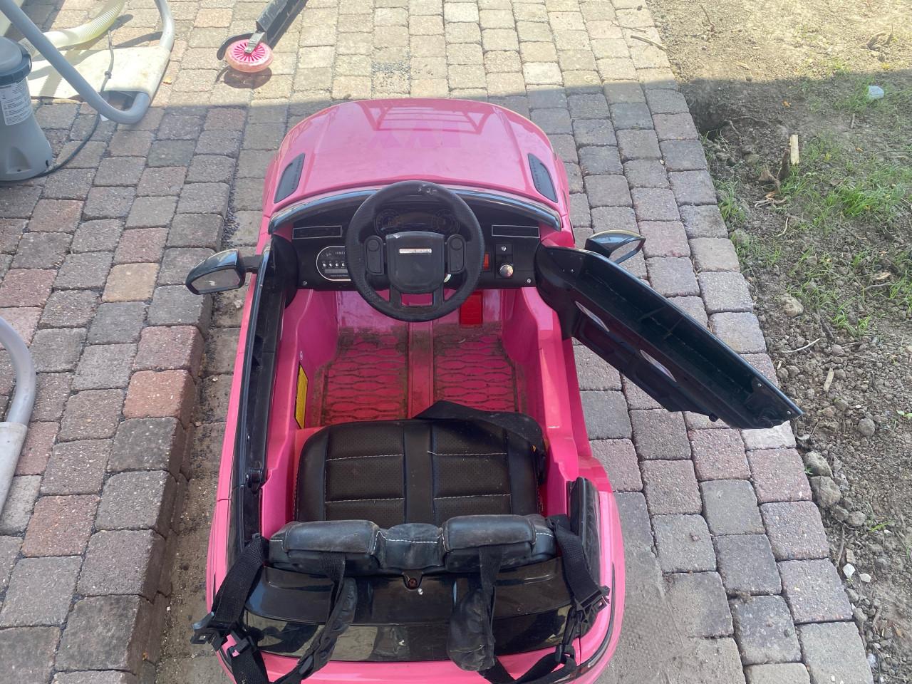 Roze elektrische auto kind speelgoed