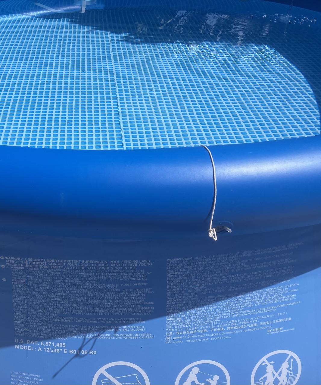 Rond zwembad met filterpomp