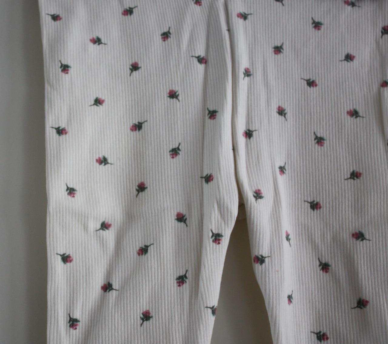 Witte legging met bloemen print maat 68