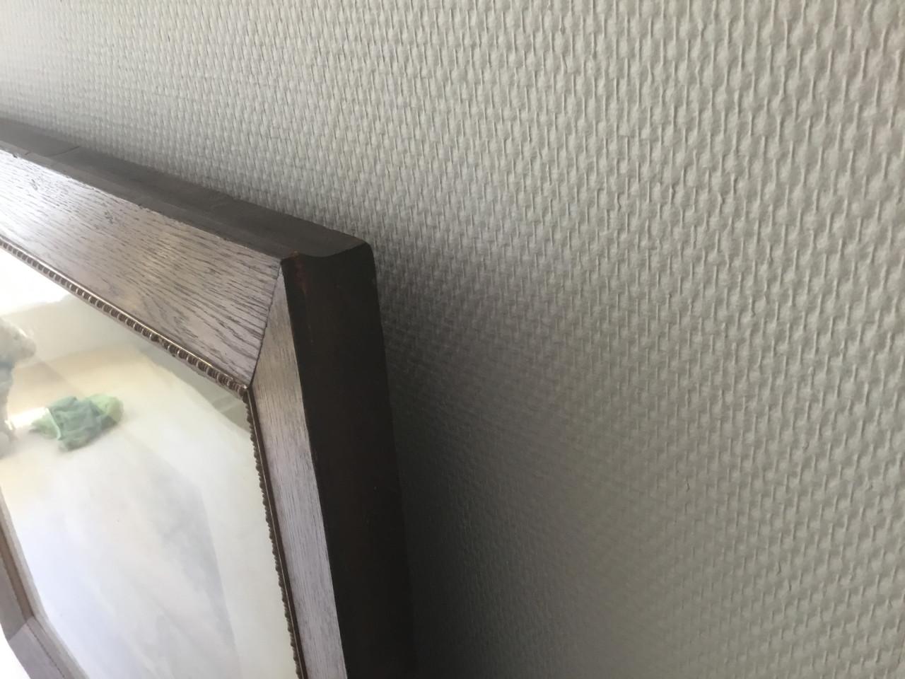 Lijst met landelijk plaatje achter glas.