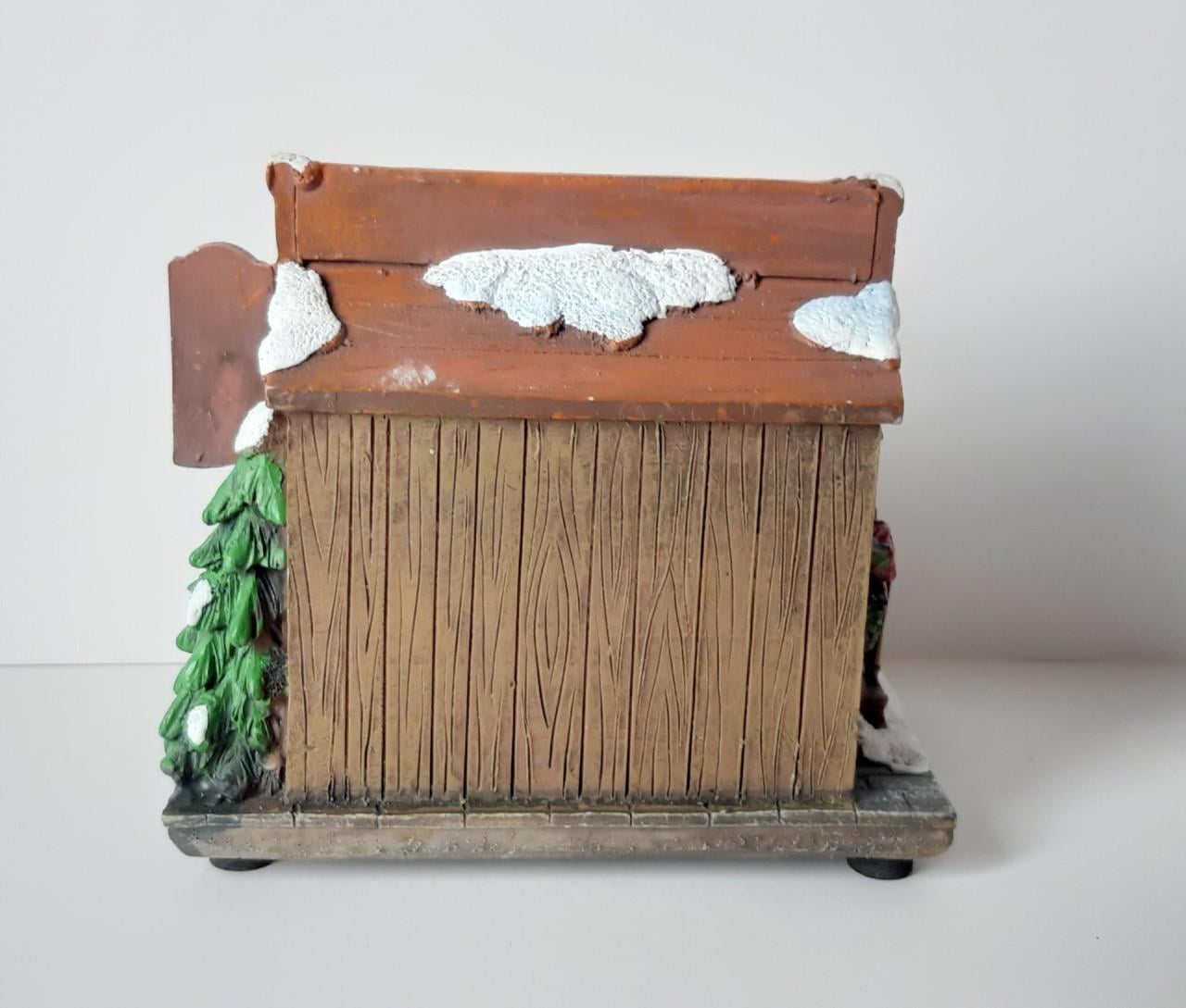 Hollands kraam: schaatsen en sleeën, kerstdecoratie met verlichting