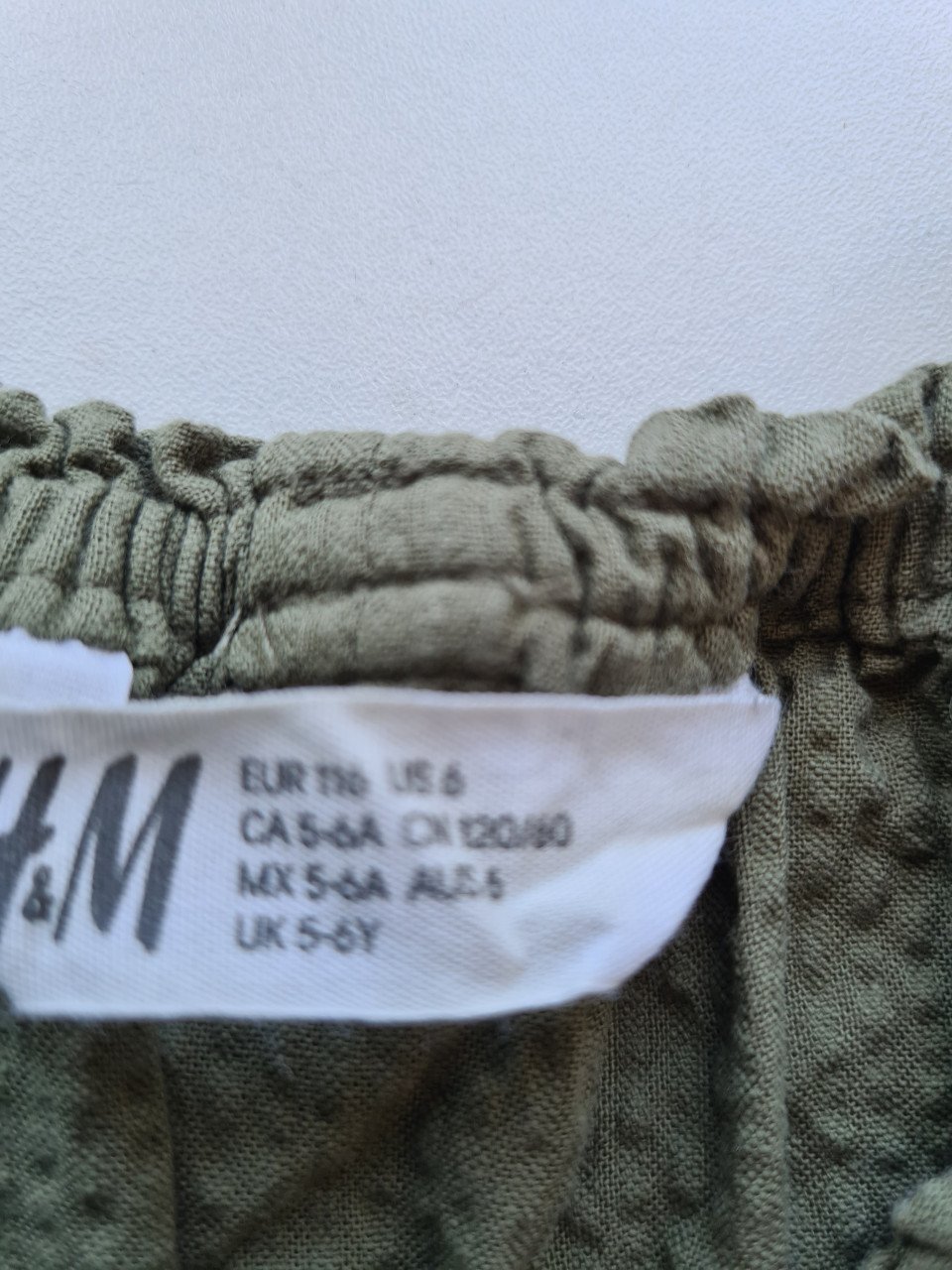 Kaki groen jumpsuit van H&M Maat 116
