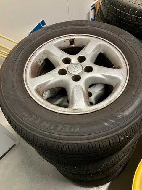 Banden met velg 235/60/R16 All Season