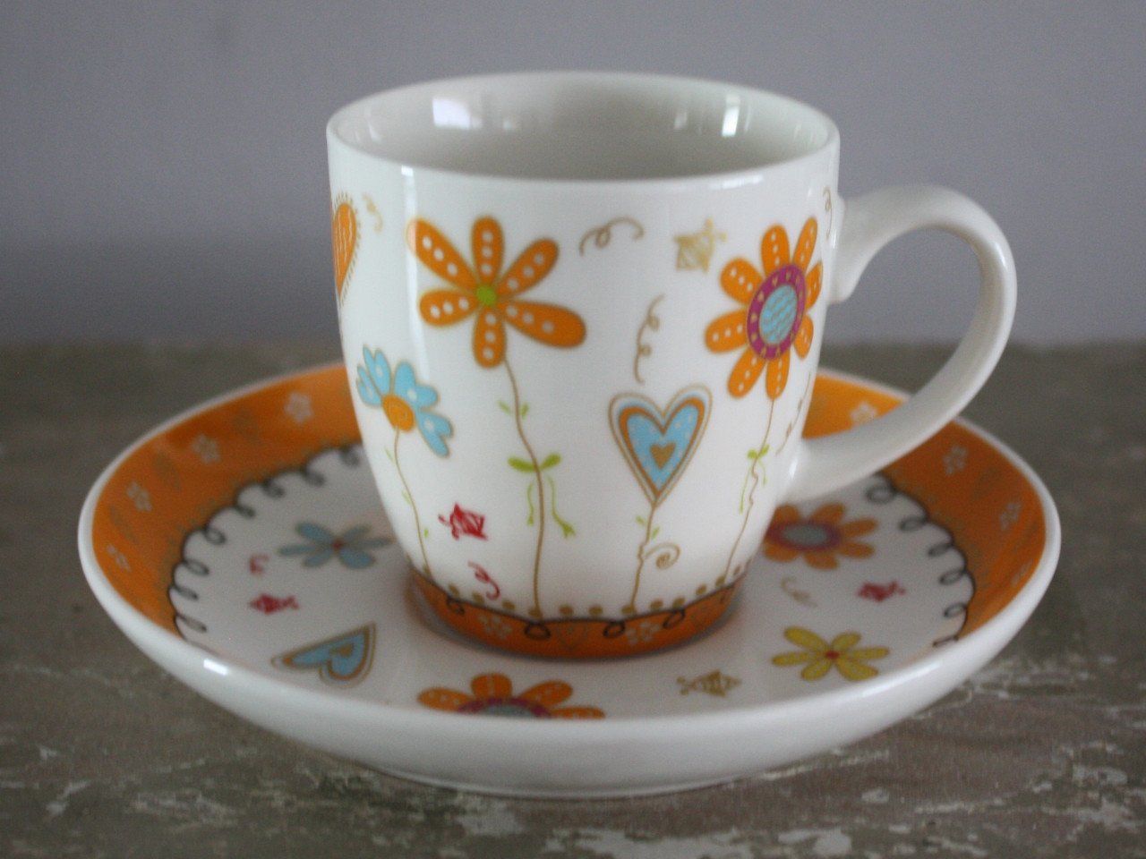 Kleurrike n vrolijke print espresso kopje en schotel