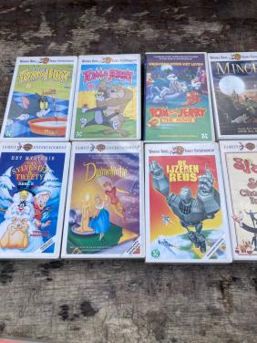 Te koop: 8 Warner Brothers VHS videobanden