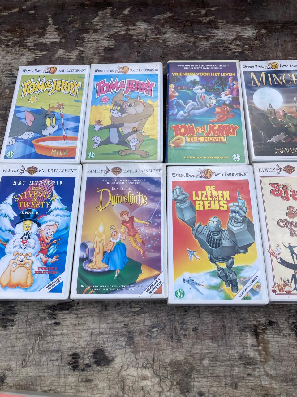 Te koop: 8 Warner Brothers VHS videobanden