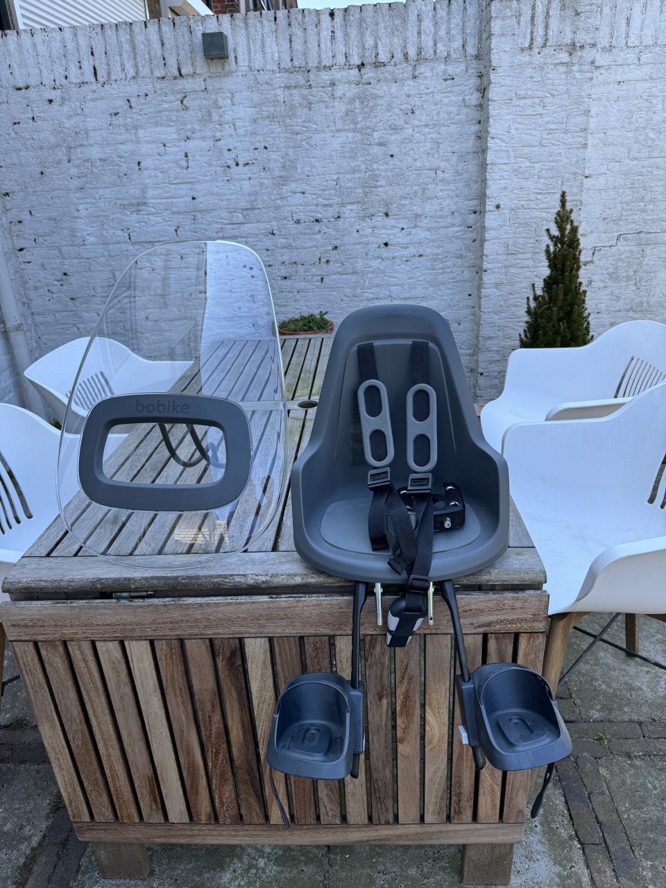 Bobike voorzitje inclusief windscherm en bevestigingsblokje