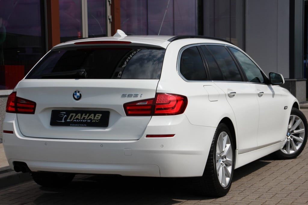 BMW 5 Serie touring 523i high executive | leder | memory | pano | dealer on