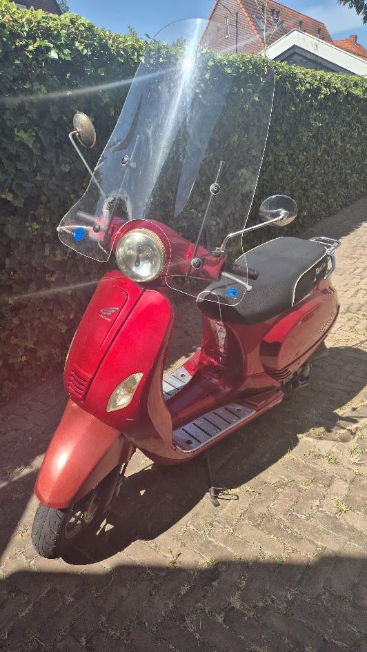 Leuke nog goed rijdende scooter