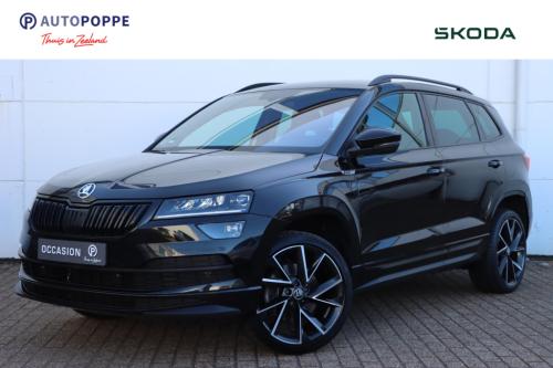 Skoda Karoq 1.5 tsi 150pk dsg7 sportline business trekhaak | camera | carpl