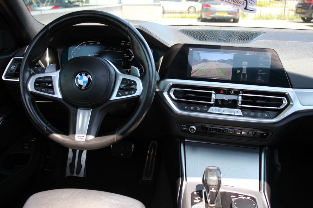 BMW 3-serie touring 320i high executive m pakket | pano | laser | leder