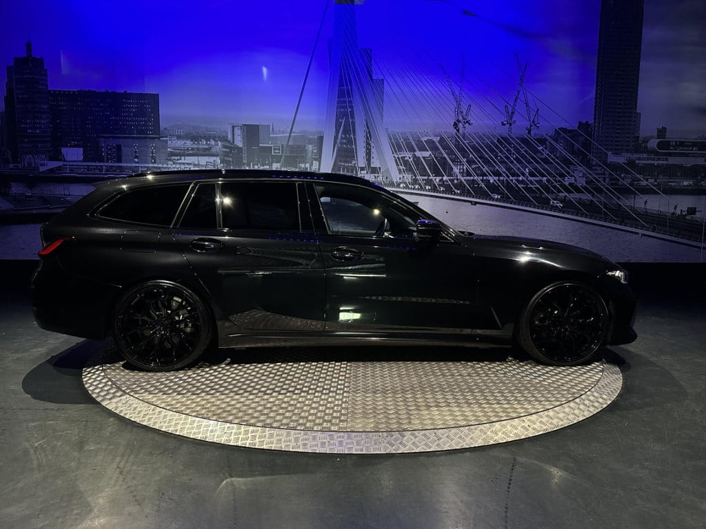 BMW 3-serie touring 330e xdrive *pano*360camera*sportstoelen*laser*eibach*