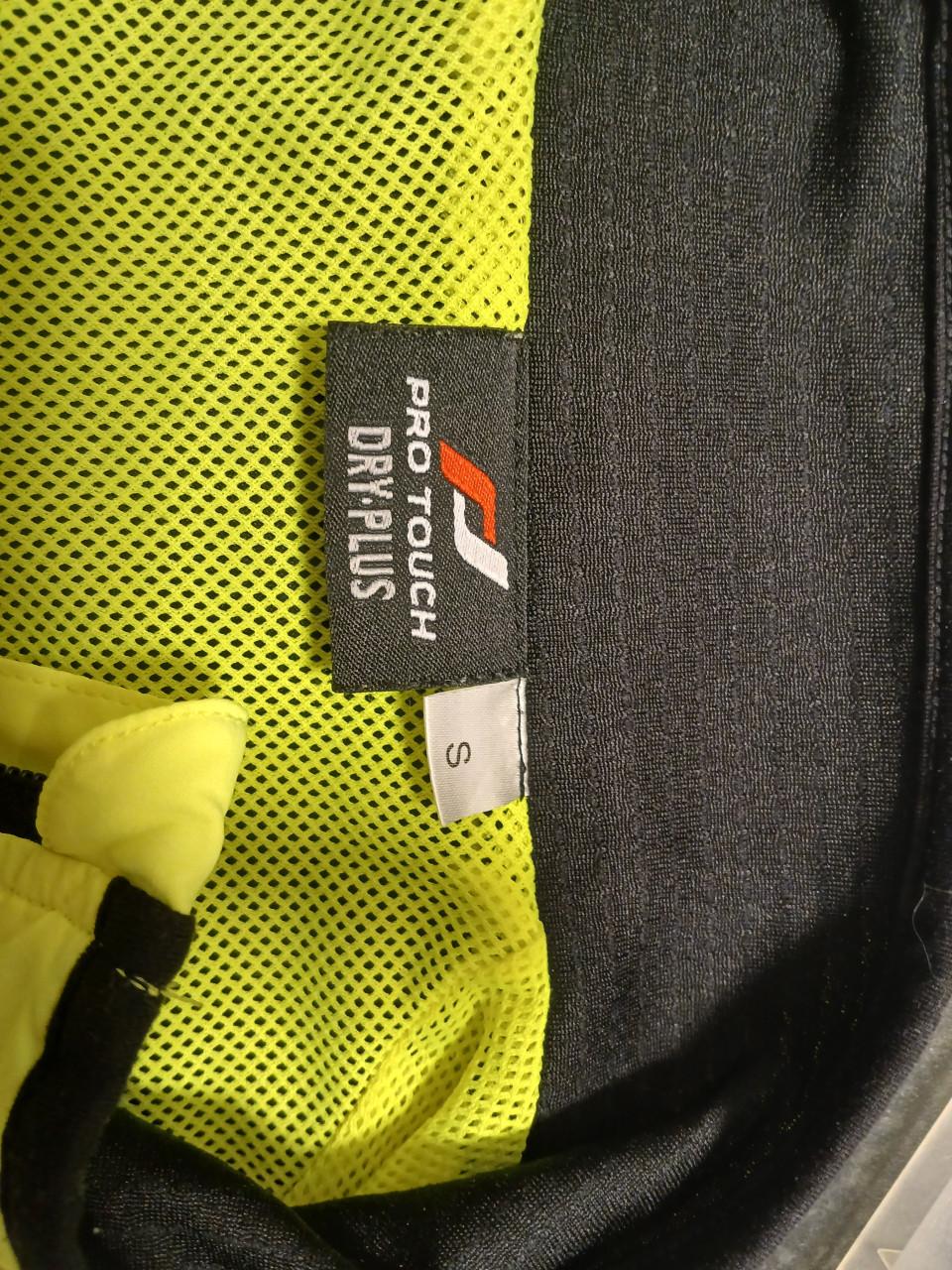 Bijna nieuw hardloop jasje maat S