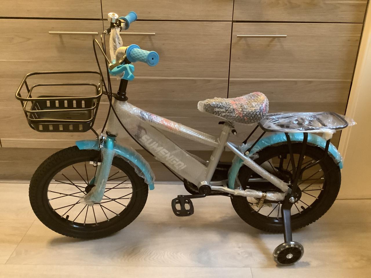 Nieuwe 16 inch jongensfiets met handrem en zijwieltjes