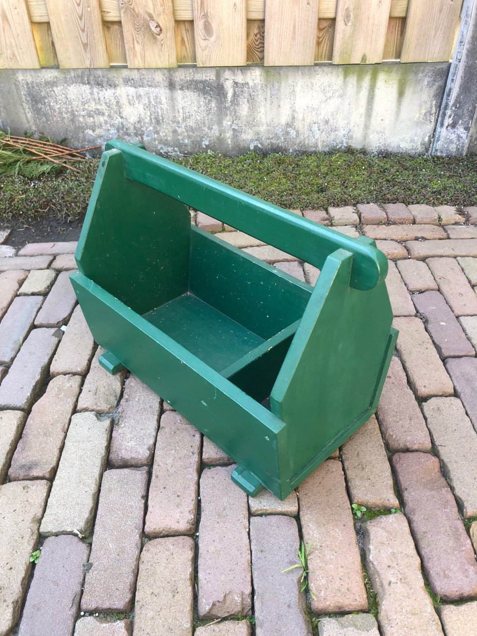 Groene houten bak.