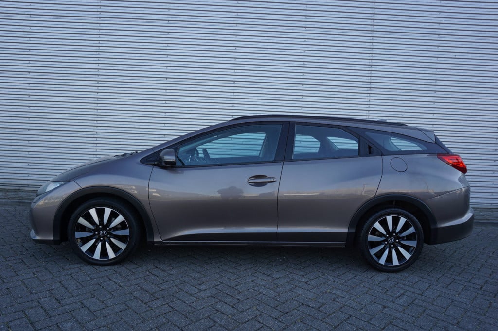 Honda Civic tourer 1.8 sport business edition climate / stoelverw. / cruise
