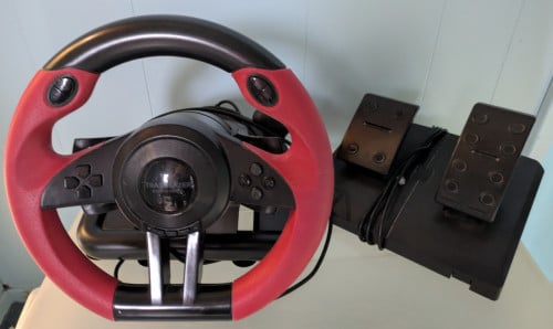 Gamestuur met pedalen