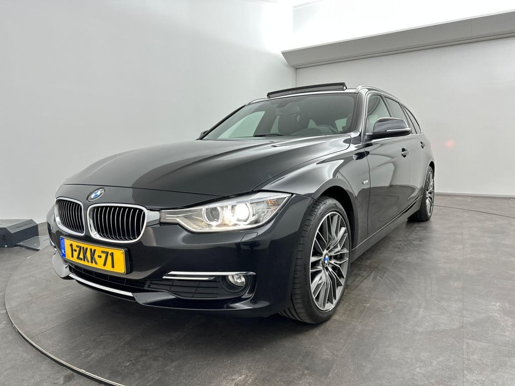 BMW 3-serie touring 320d high executive pano leder automaat