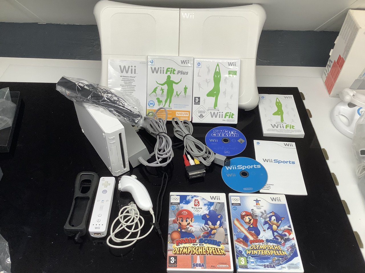 Nintendo Wii compleet, zonder doos met veel spellen.