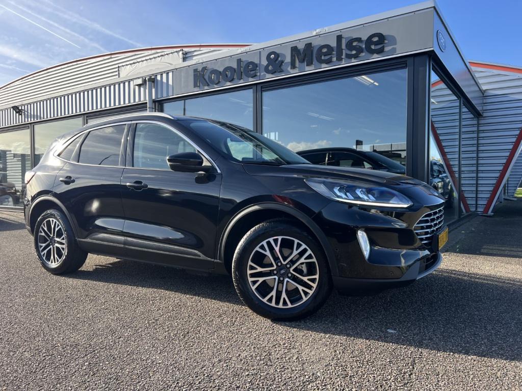 Ford Kuga 2.5 phev e-cvt 225pk titanium , voorruitverwaming , adaptive cc ,