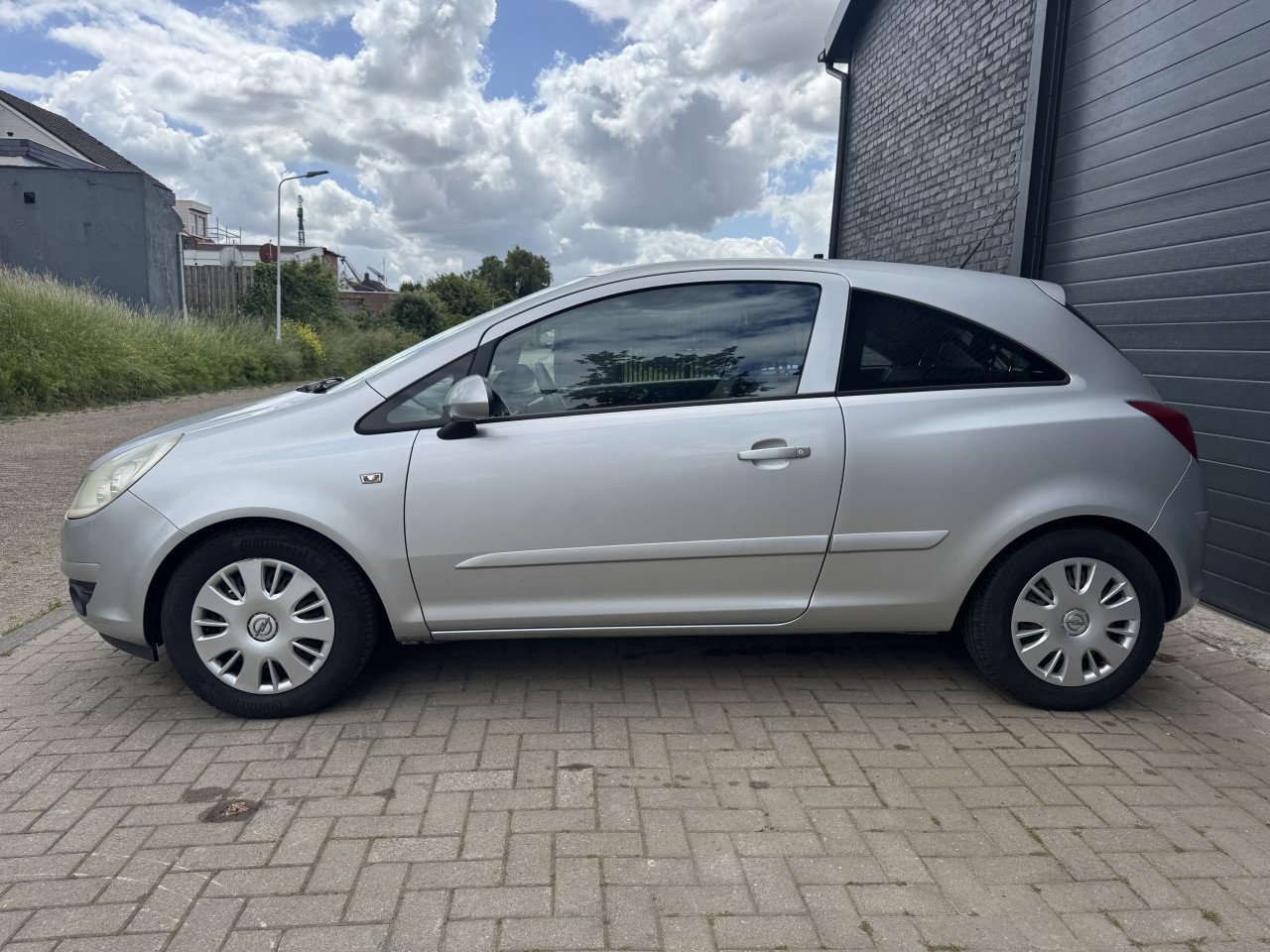Opel Corsa 1.4 16V 66KW 3DRS 2007 Zilver Airco Apk Cruise Nap