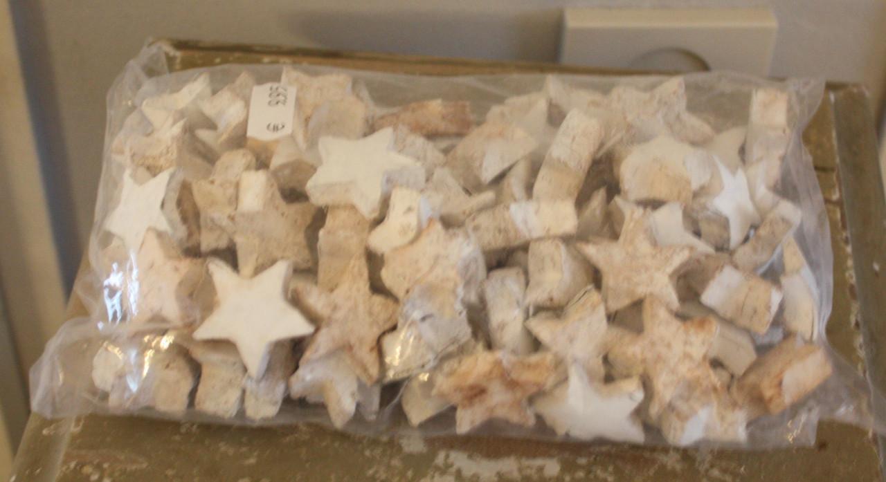 Dichte nieuwe zak met houten sterretjes
