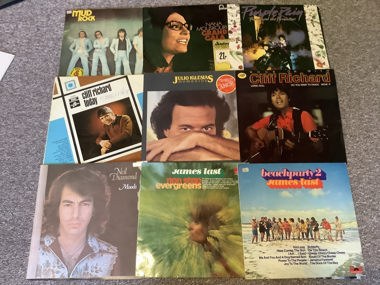 Verschillende lp’s van bekende artiesten, Van Elvis tm Mud en Prince.