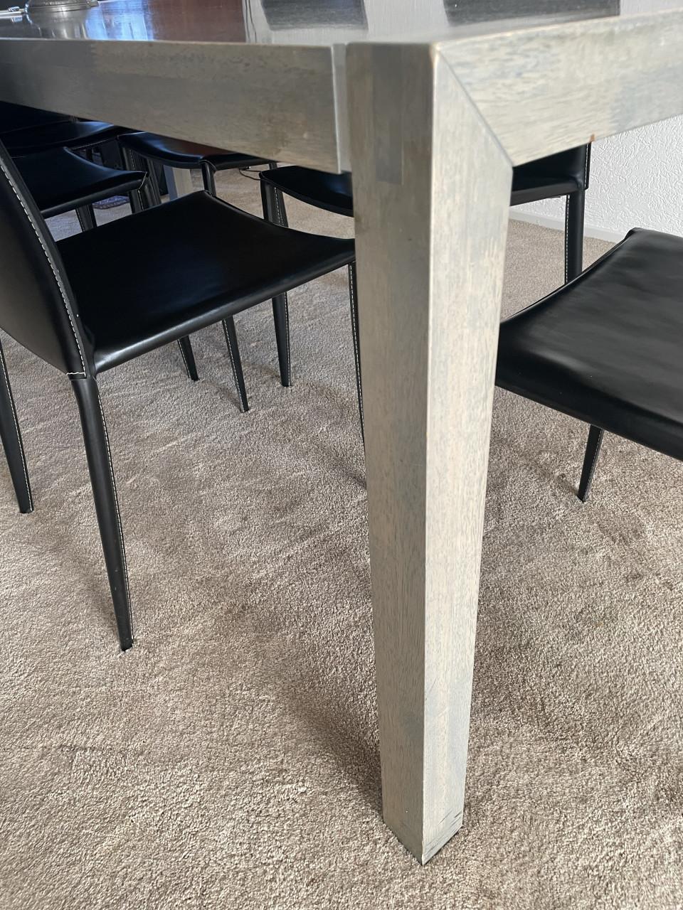 Eethoek (houten tafel 2 meter en leren stoelen)