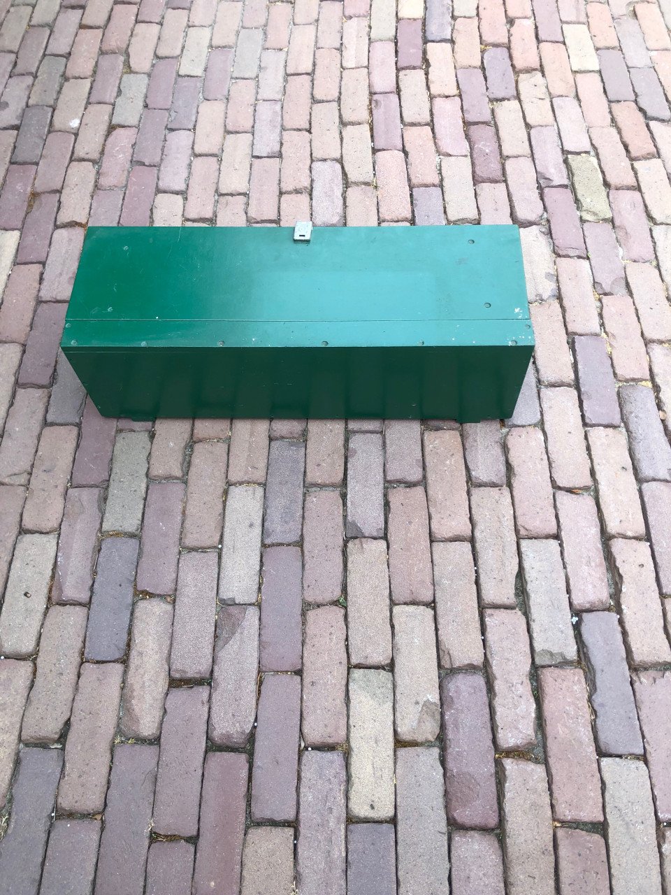 Groene houten kist.