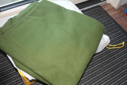 Lap groene wollige stof..