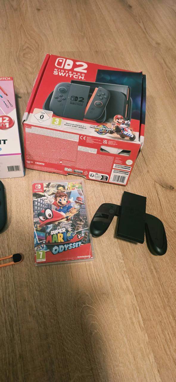 Als nieuw Nintendo switch 2 met spellen en extra