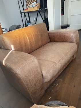 Leren love seat cognac kleur in goede staat