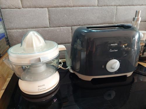 Philips Cucina citruspers & broodrooster