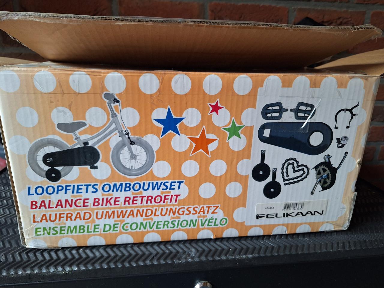 Loopfiets Pelikaan met ombouwset trappers en zijwieltjes