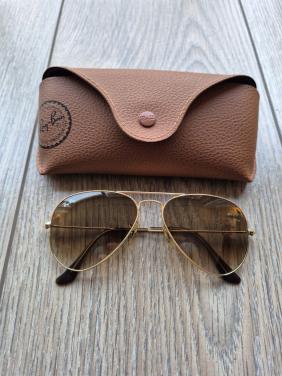 Ray-ban zonnebril goud met opberghoes